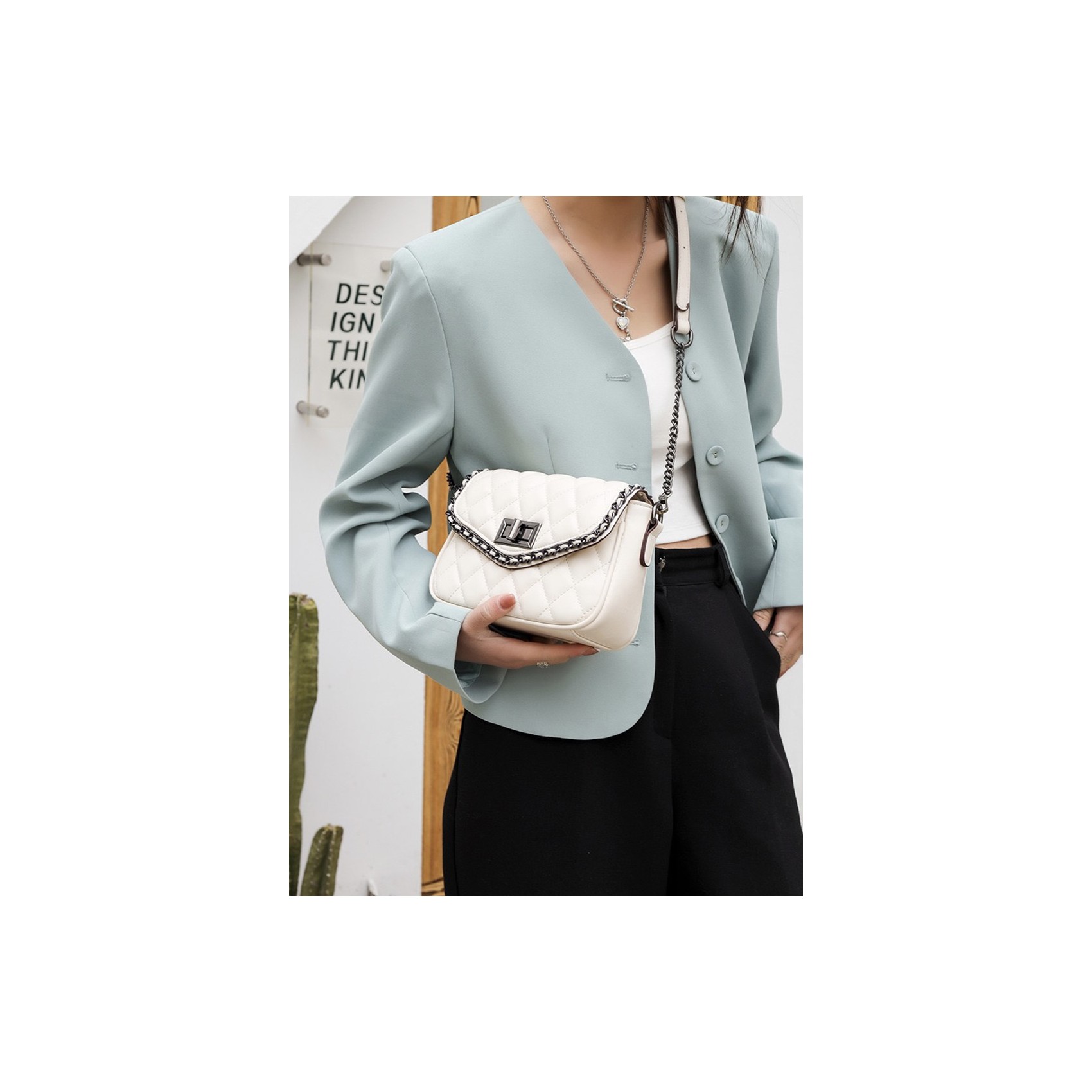 Жіноча сумка-клатч Beverly біла