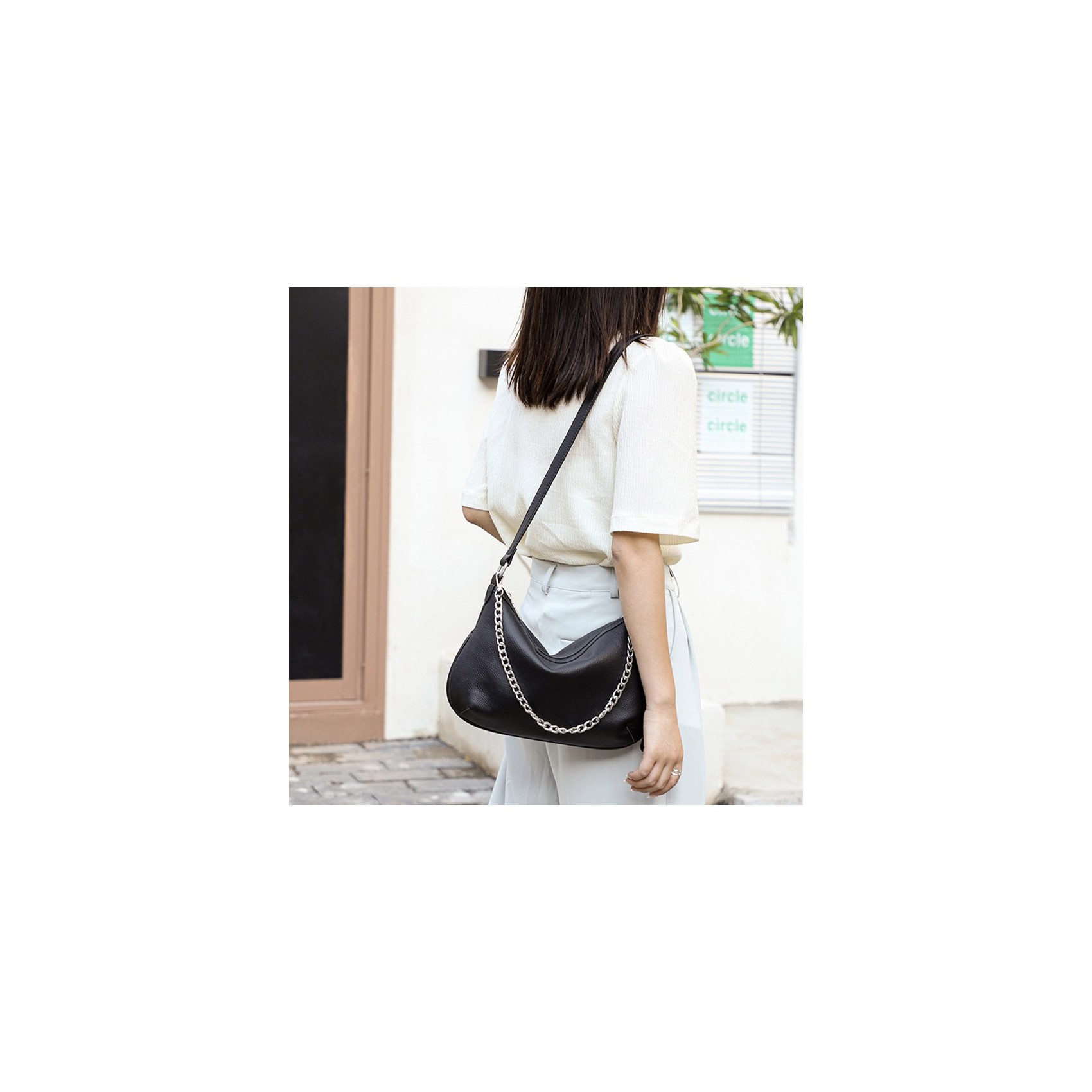 Женская кожаная сумка хобо Donna черная