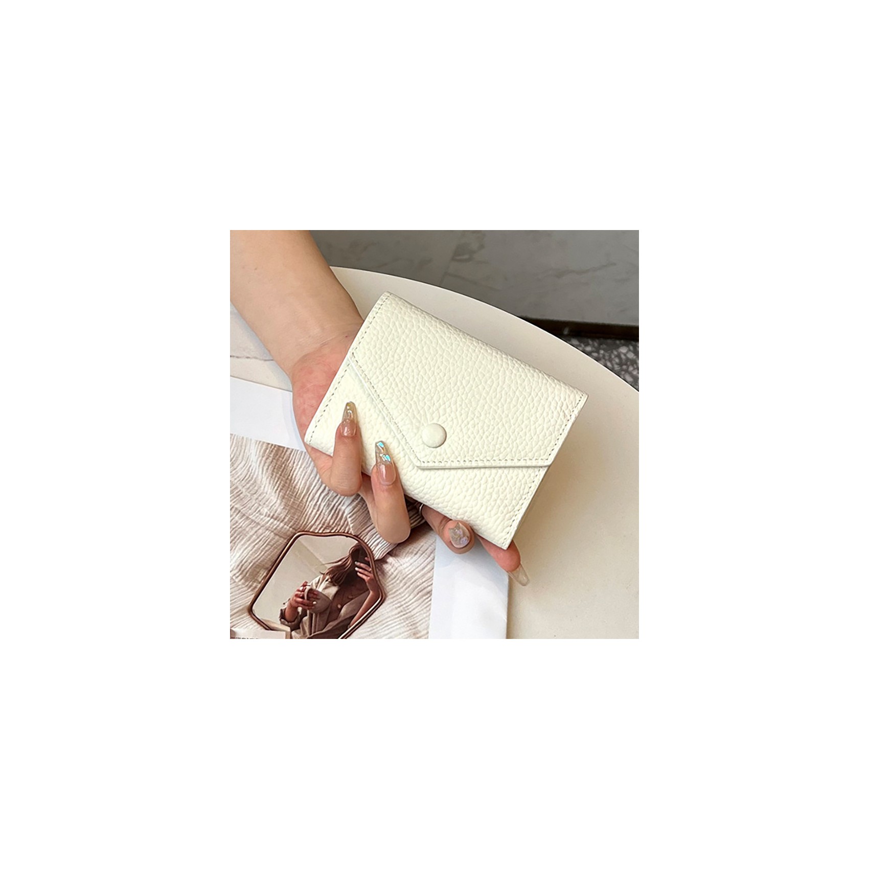 Жіночий шкіряний гаманець Ellie білий