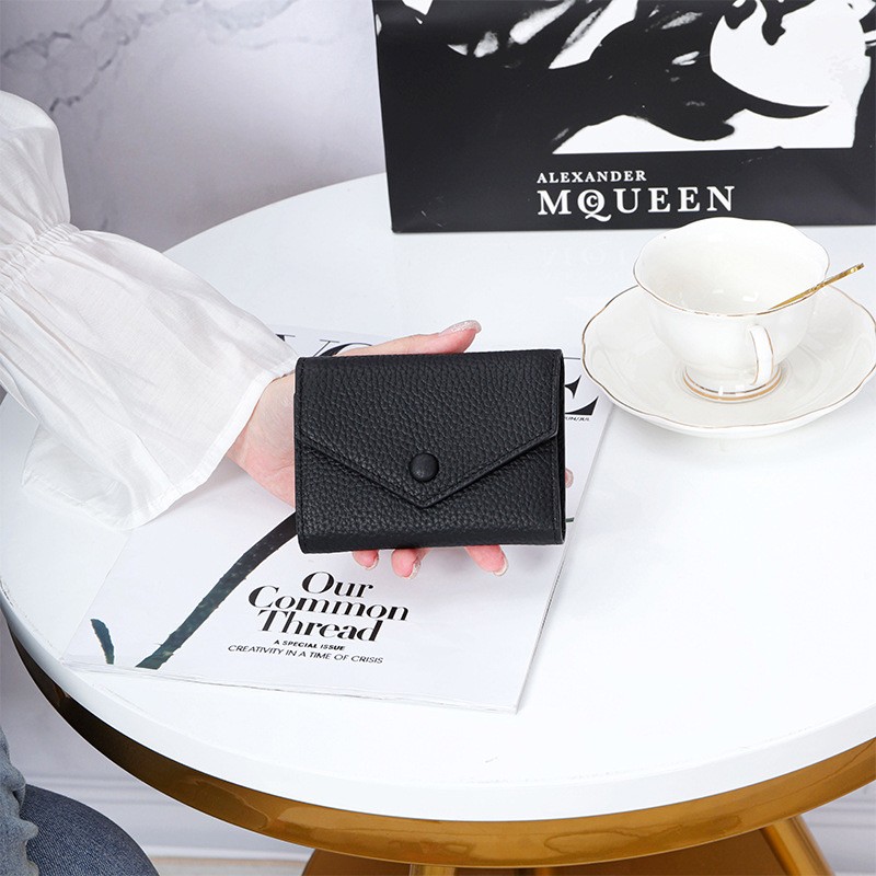 Жіночий шкіряний гаманець Ellie чорний - 2 фото