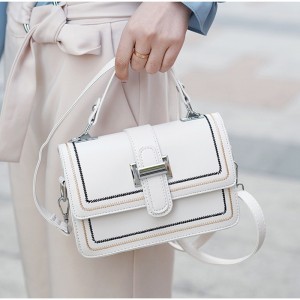 Жіноча сумка крос боді Corinne молочна