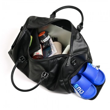 Мужская кожаная дорожная сумка Gerald черная фото