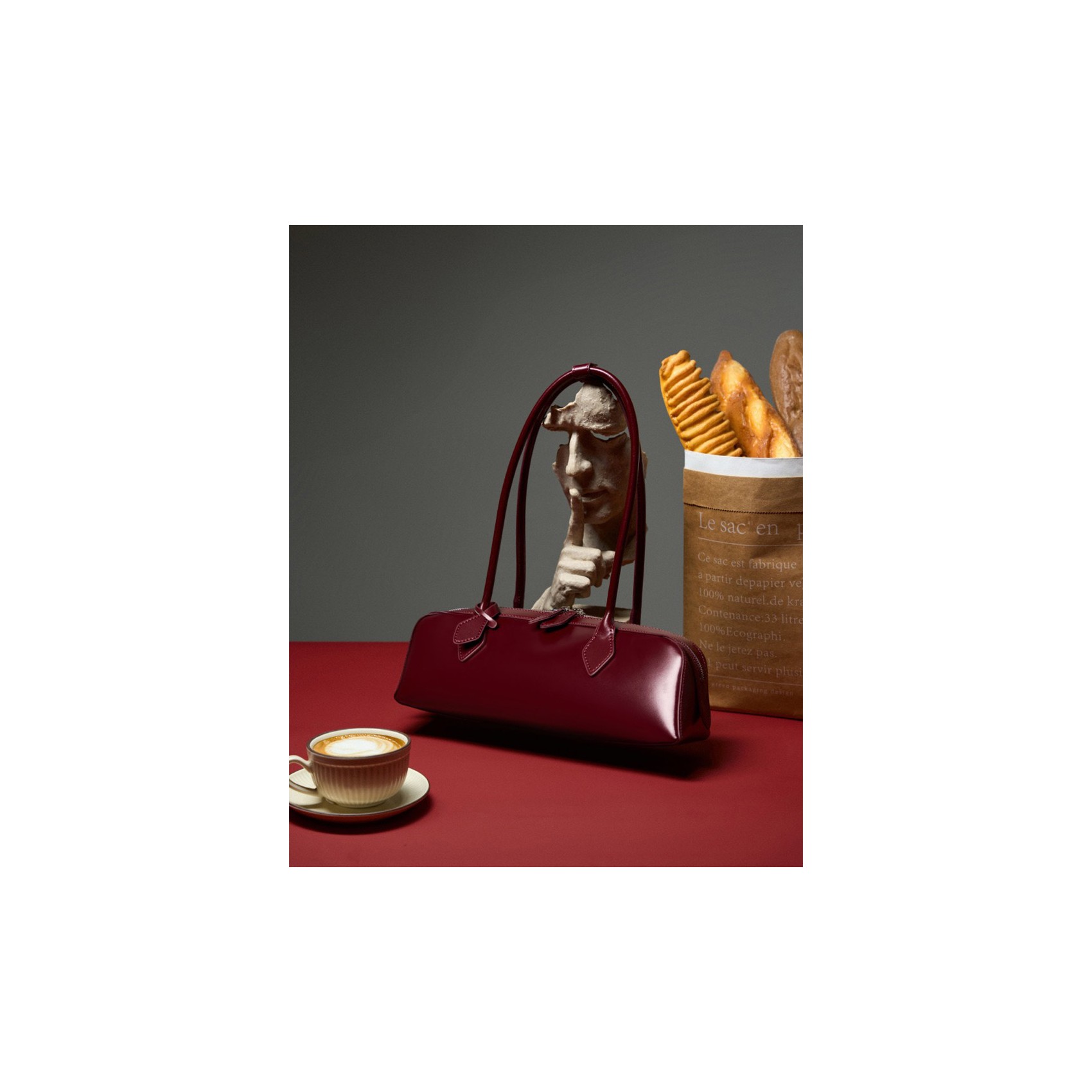 Женская кожаная сумка багет Melody бордовая