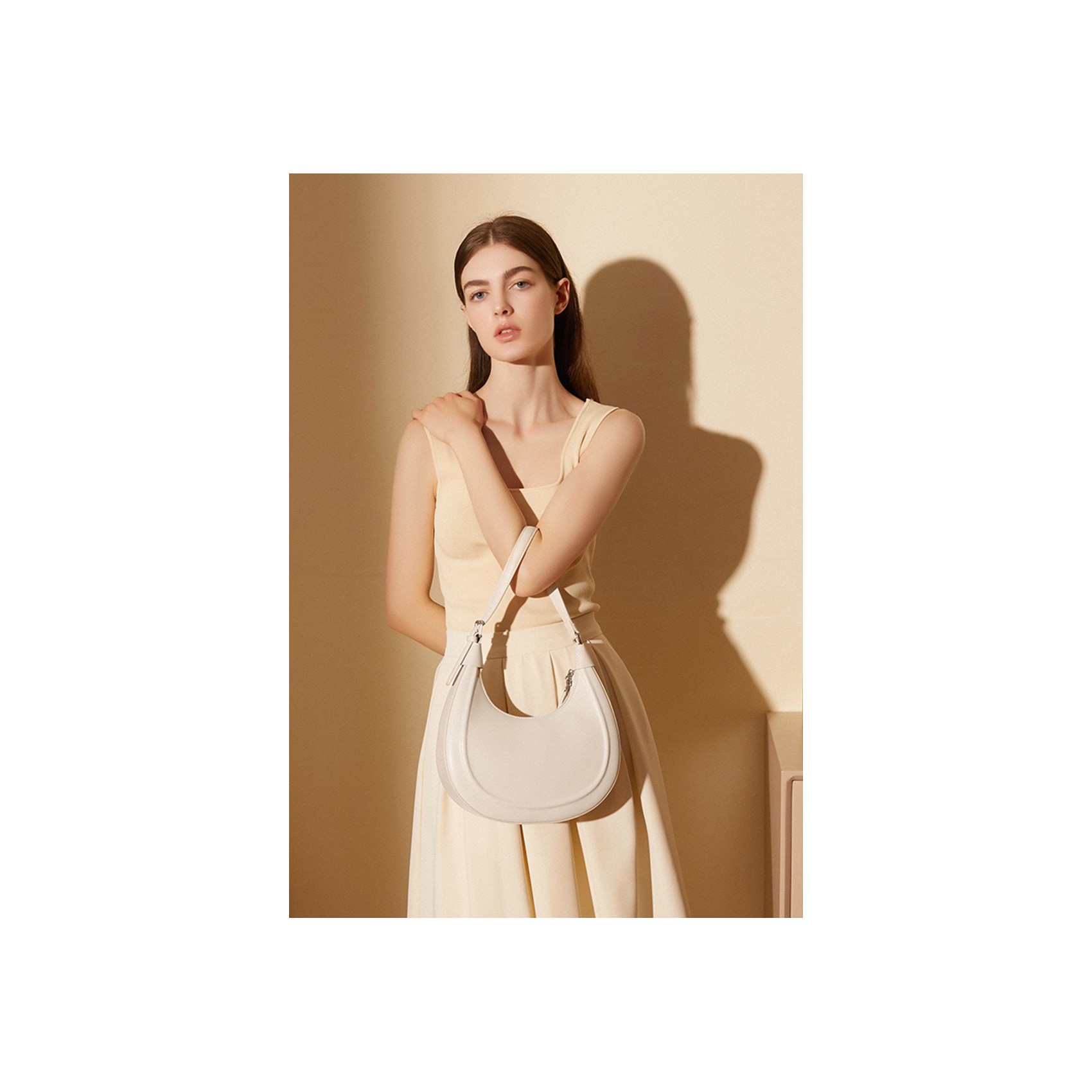 Жіноча шкіряна сумка хобо Veronica біла