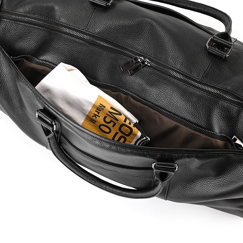 Чоловіча шкіряна дорожня сумка Edwin чорна - 15 фото