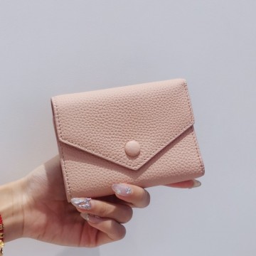 Жіночий шкіряний гаманець Ellie світло-рожевий фото